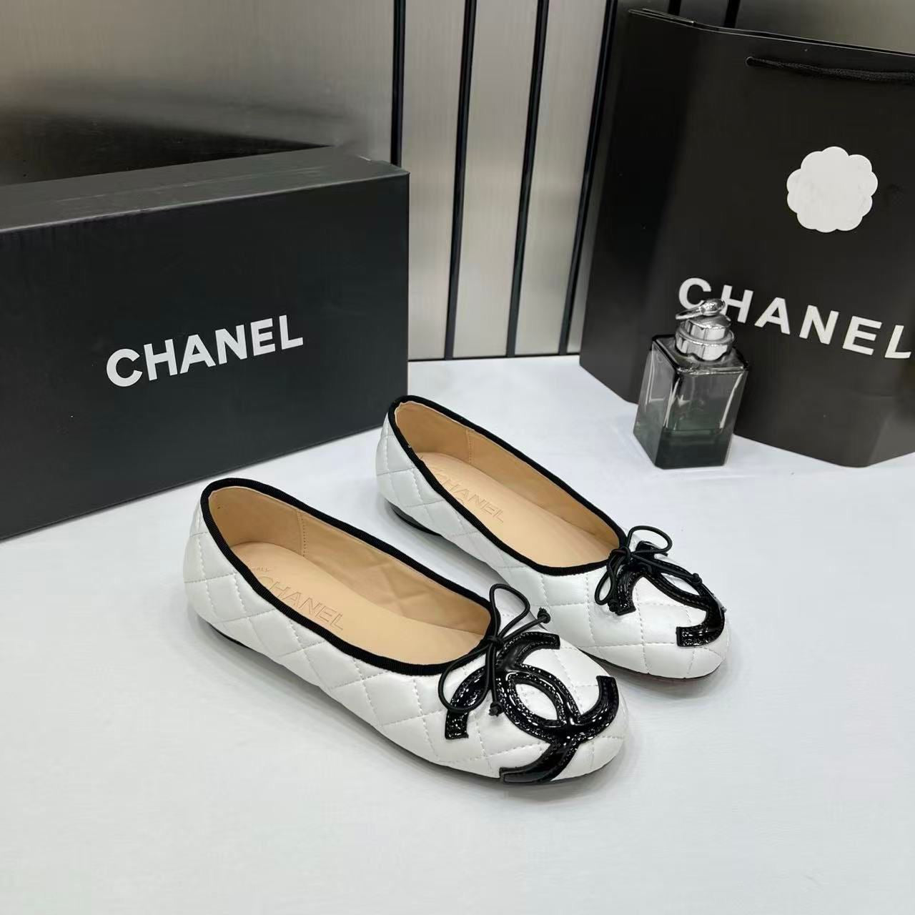 CHANEL QUILTED CAMBON LEATHER BALLET FLATS