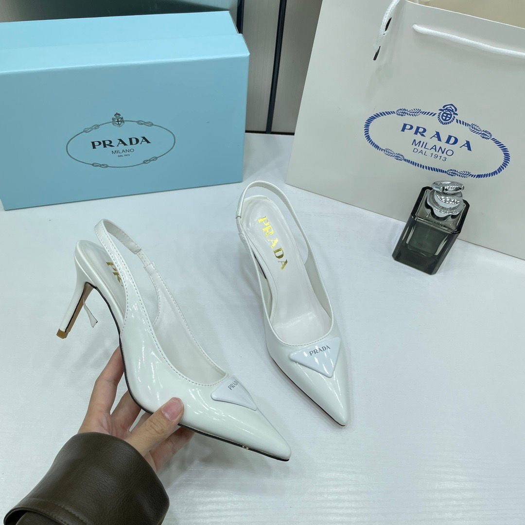 PRADA PATENT LEATHER SLINGBACK PUMPS WHITE