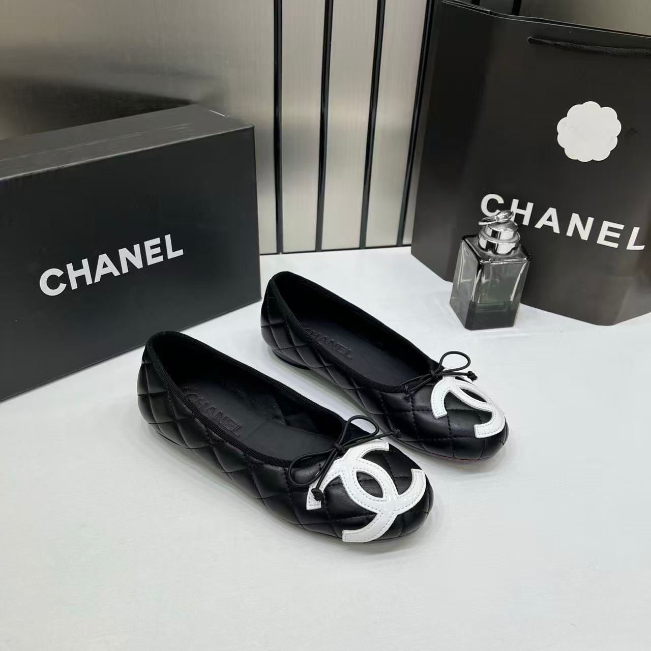 CHANEL QUILTED CAMBON LEATHER BALLET FLATS