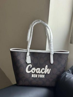 COACH CITY TOTE BAG IN SIGNATURE CANVAS GRAPHIC