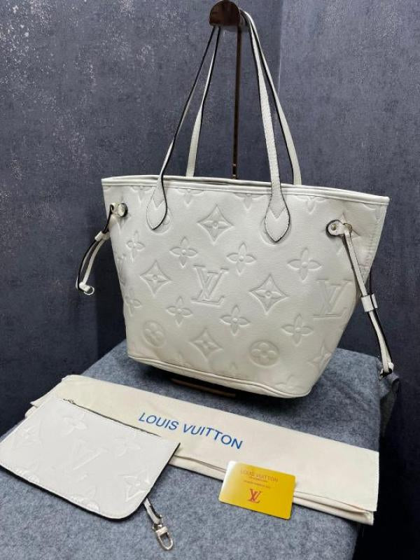 LOUIS VUITTON OFFWHITE MONOGRAM GIANT WITH POUCH EMPREINTE LEATHER