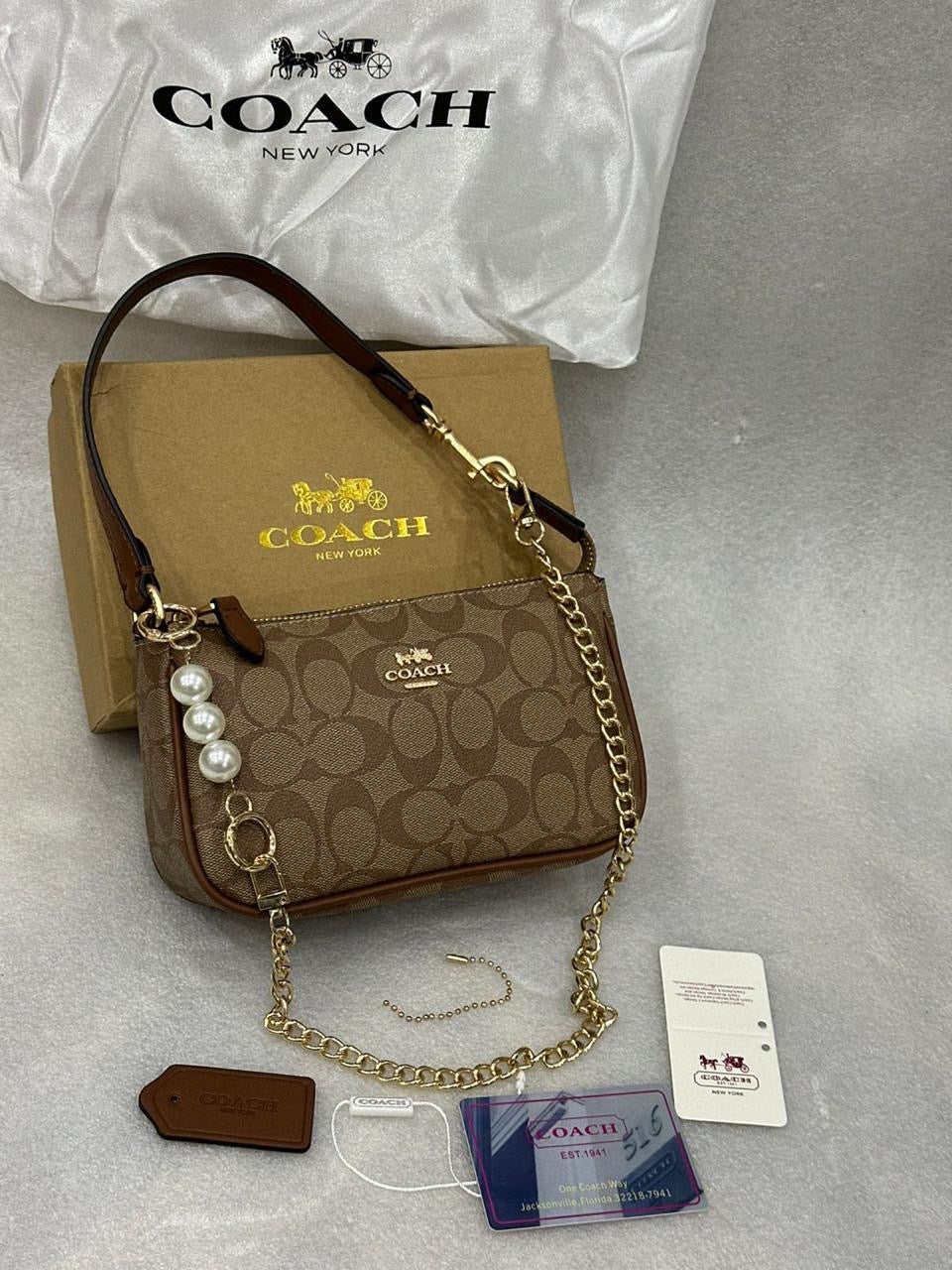 COACH NOLITA 19 SLING BAG